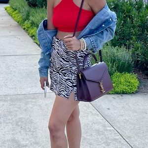 High waisted zebra print mini skirt.